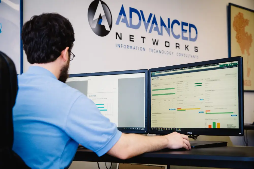 Advanced Networks engineer monitoring client systems